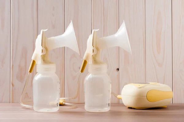 Double Breast Pump Blank Baby Bottle Wood Background — Stock Photo, Image