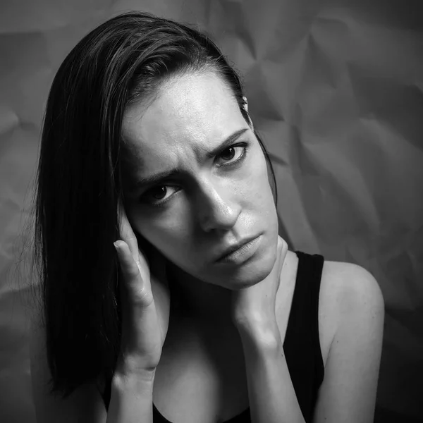 Sad young woman. Black and white