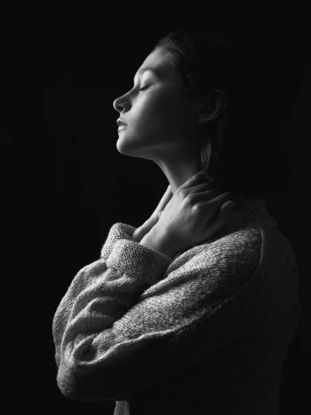 Portrait of the beautiful young woman. Profile. Black and white