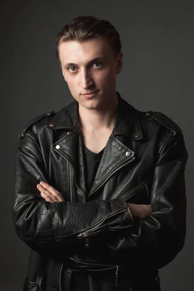 Portrait of the  handsome young man in leather jacket.