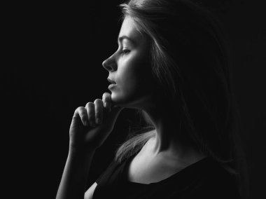 Portrait of young woman in profile. Black and white. clipart