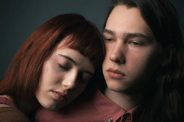 Passionate couple in love. Close up. Studio portrait.