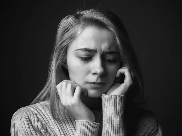 Portrait of sad young woman. Black and white