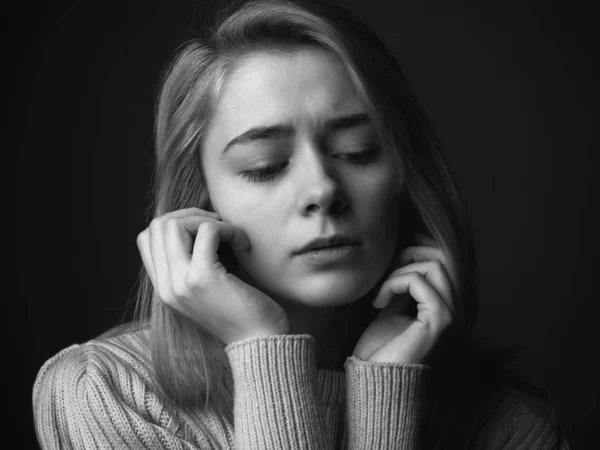 Portrait of sad young woman. Black and white