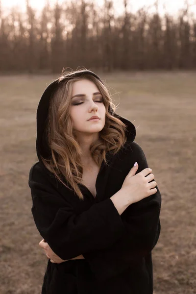 Young Woman Black Cape Walking Outdoors Autumn Eyes Closed — Stock Photo, Image