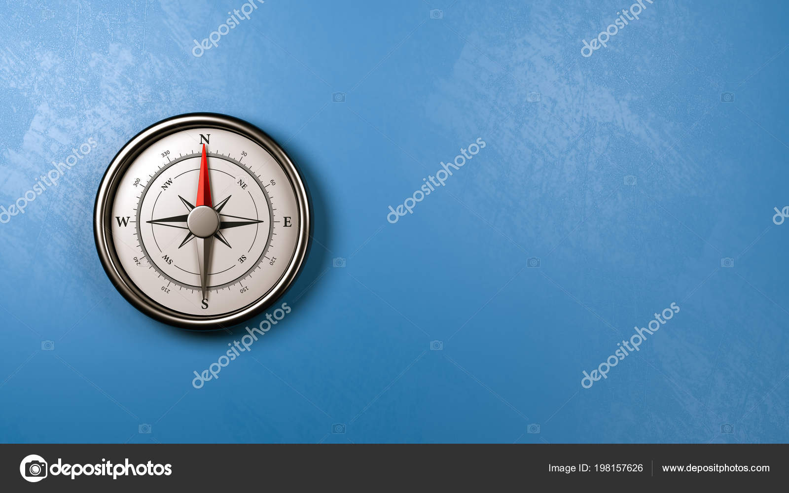 Metallic Compass Red Needle Pointing North Plastered Blue Wall