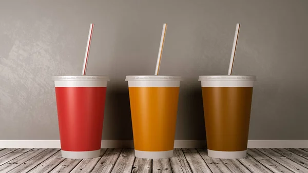 Fastfood drinken Cups op houten vloer tegen muur — Stockfoto