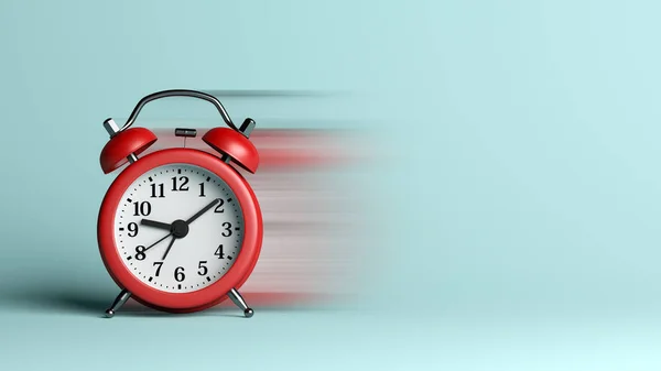 Reloj despertador rojo con efecto de desenfoque sobre fondo azul —  Fotos de Stock