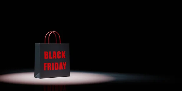 Shopping Bag with Black Friday Text Spotlighted on Black Background — Stok Foto