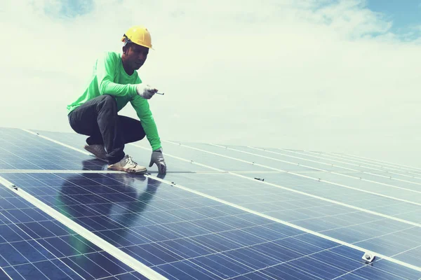 engineer team working on replacement solar panel in solar power plant;engineer and electrician team swapping and install solar panel after solar panel voltage dro