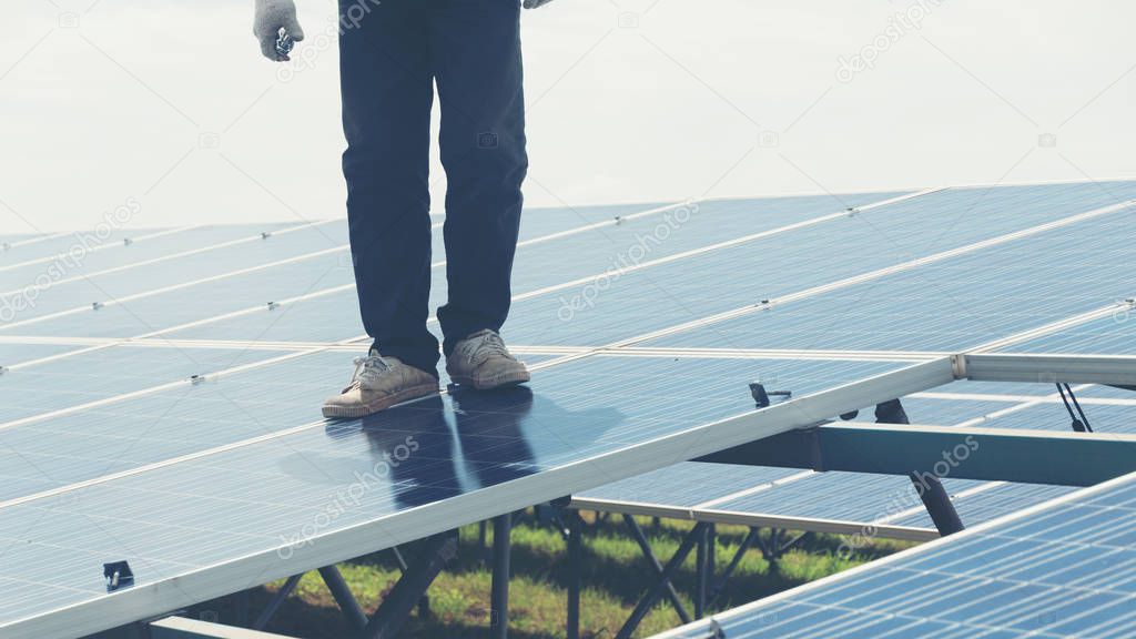 engineer team working on replacement solar panel in solar power plant;engineer and electrician team swapping and install solar panel after solar panel voltage dro