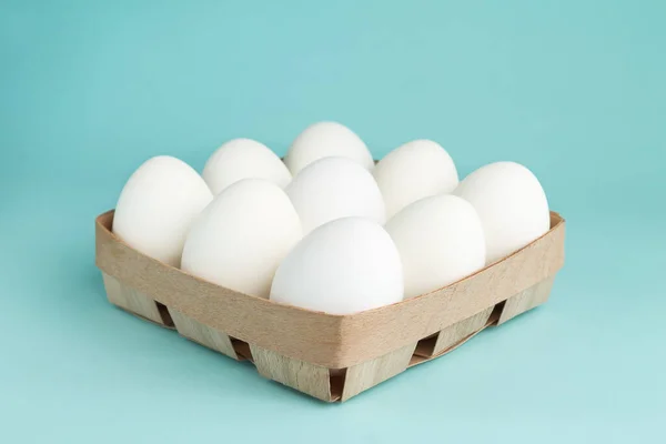 Chicken Eggs Wooden Package Nine White Eggs Box Blue Background — Stock Photo, Image