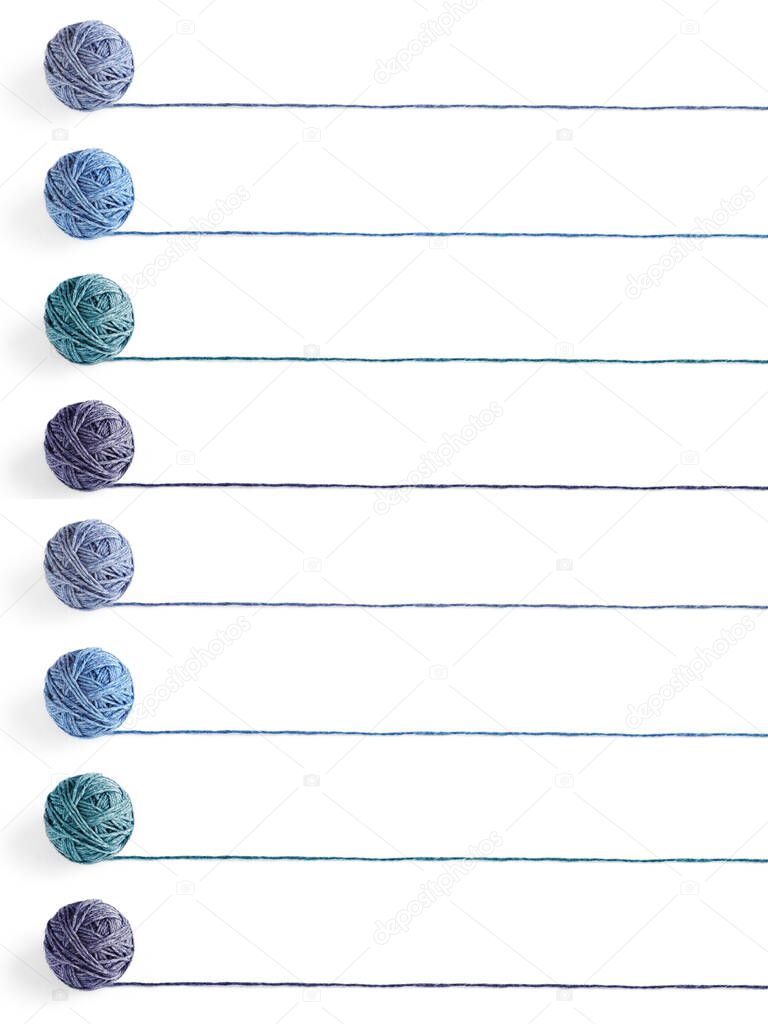 Four multicolored woolen balls of yarn isolated on white bacground. Blank for the list.