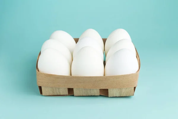 Chicken Eggs Wooden Package Nine White Eggs Box Blue Background — Stock Photo, Image