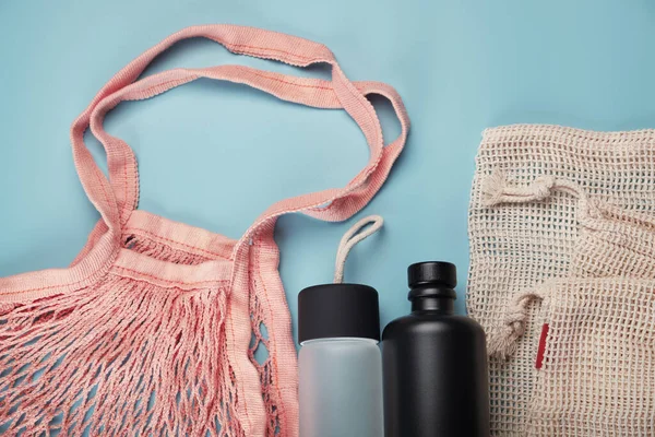 Cotton Eco Bags Water Bottles Blue Background Zero Waste Concept — Stock Photo, Image