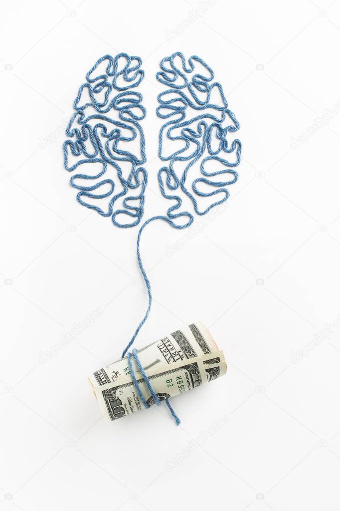 Brain and dollar bills. Making money with the mind