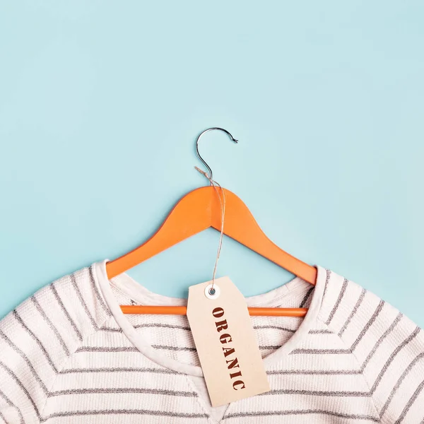 White Striped Sweatshirt Hanger Tag Inscription Organic Eco Friendly Clothing — Stock Photo, Image