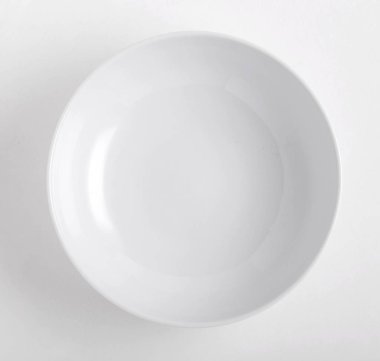 Beyaz Restoran plaka yükseltilmiş görünümünü beyaz masanın üzerine yerleştirilen