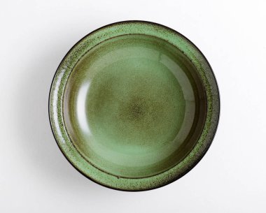 Yeşil Restoran plaka yükseltilmiş görünümünü beyaz masanın üzerine yerleştirilen