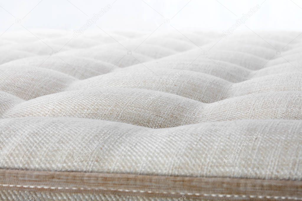 close up of white texture of mattress, bedding pattern background