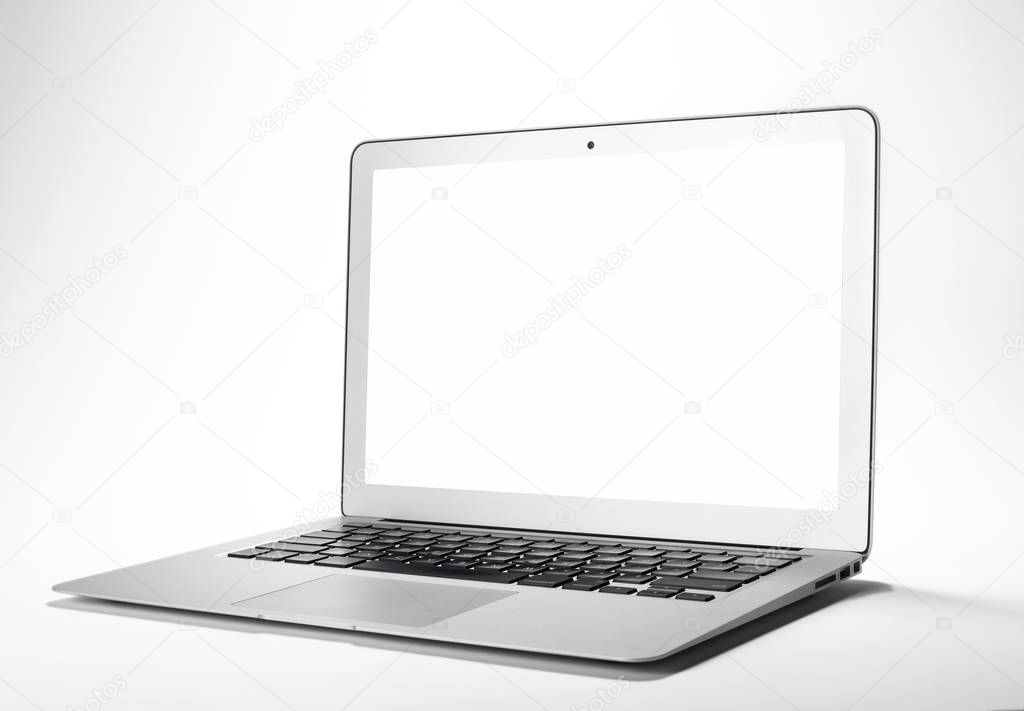 Closeup of modern laptop isolated on white