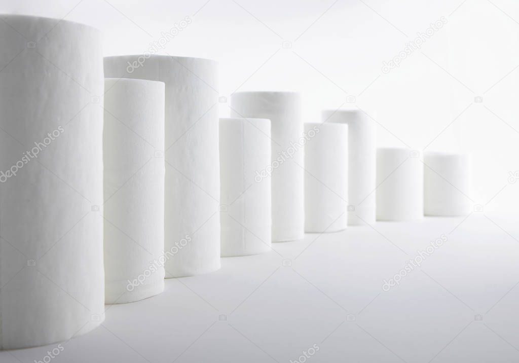 Closeup of white paper rolls isolated on white background 