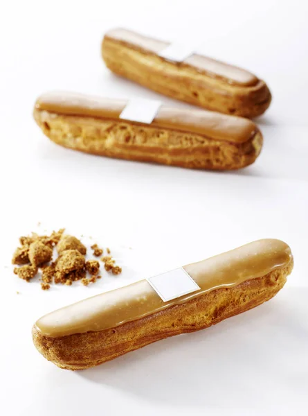 Délicieuses Bouffées Sucrées Éclairs Sur Table Cuisine — Photo