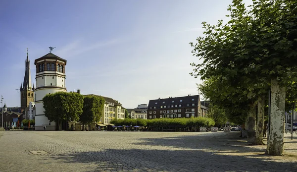 View of cobbled the open area next to the Maritime Museum tower in Dusseldorf, Germany.