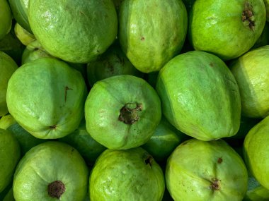Closeup photo of ripe guava fruit for healthy eating concept