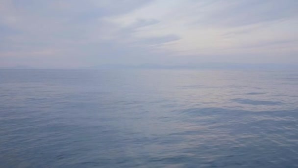 Sea landscape and bright sky with cloud. Beautiful water surface on calm sea — Stock Video