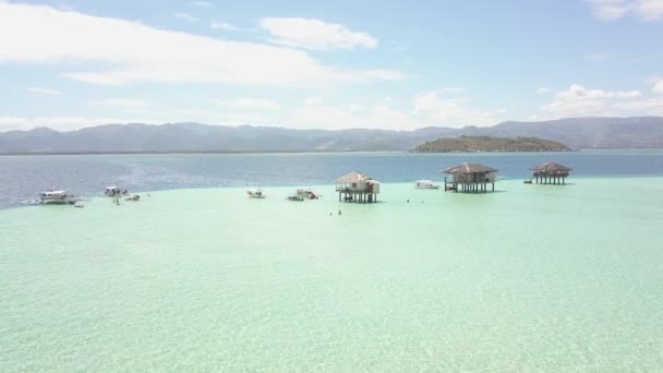 Picturesque view of tropical beach sand bar with crystal clear tuquoise water. — Stock Footage Picturesque view of tropical beach sand bar with crystal clear tuquoise water. Stock Footage