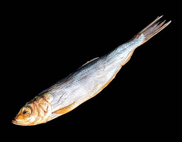 Peixe fumado Arenque do Báltico isolado sobre fundo preto — Fotografia de Stock