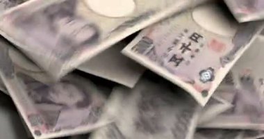 Japon Yen rengarenk arka plana düşüyor