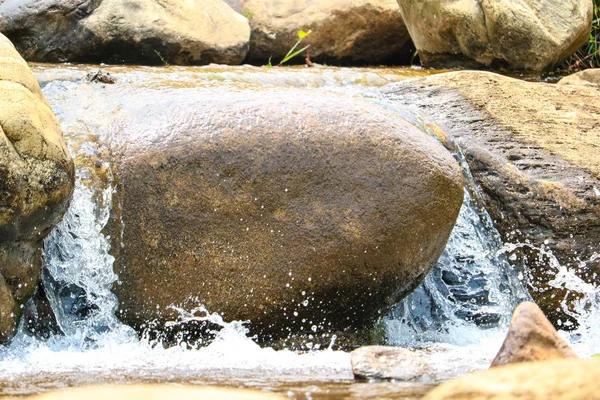 Fresh water flow through the stone on morning time