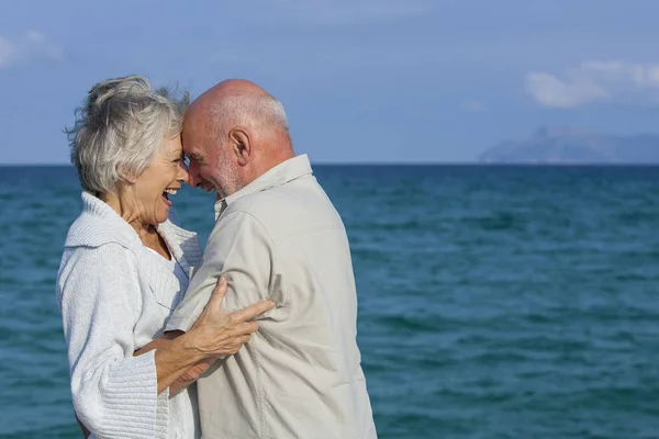 Senior Couple Hugging Laughing Seaside — Stock Photo, Image