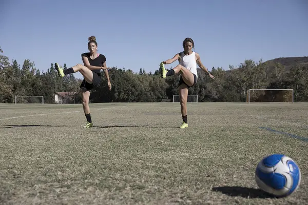 Women Stretching Legs Football Pitch — Stock Photo, Image