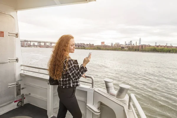 Young Businesswoman Ferry Deck Looking Smartphone New York Usa — Stock Photo, Image