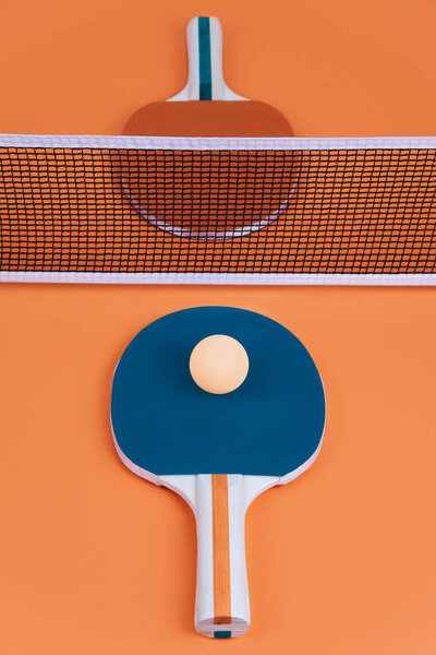 Table tennis or ping pong rackets and balls.