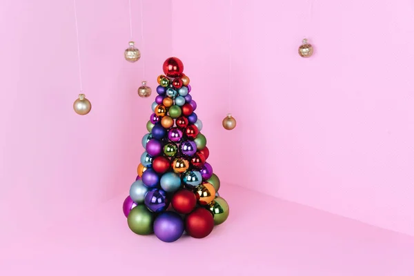 Karácsonyfa készült labda dekoráció rózsaszín háttér. — Stock Fotó