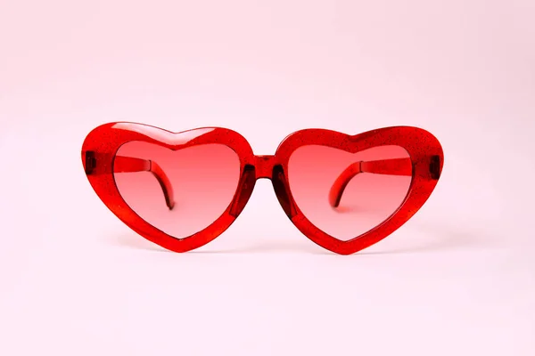 A pair of red heart shaped sun glasses. — Stock Photo, Image