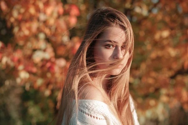 Portrait of bright-haired girl with hair covered face — Stock Photo, Image