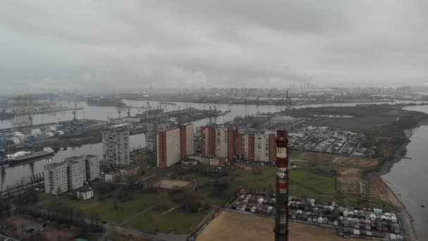 Depressing view on industrial buildings and grey sky — Stock Video