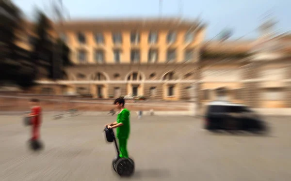 Abstract Background Guy Crosses Square Segway Blur Effect Defocusing Filter — Stock Photo, Image