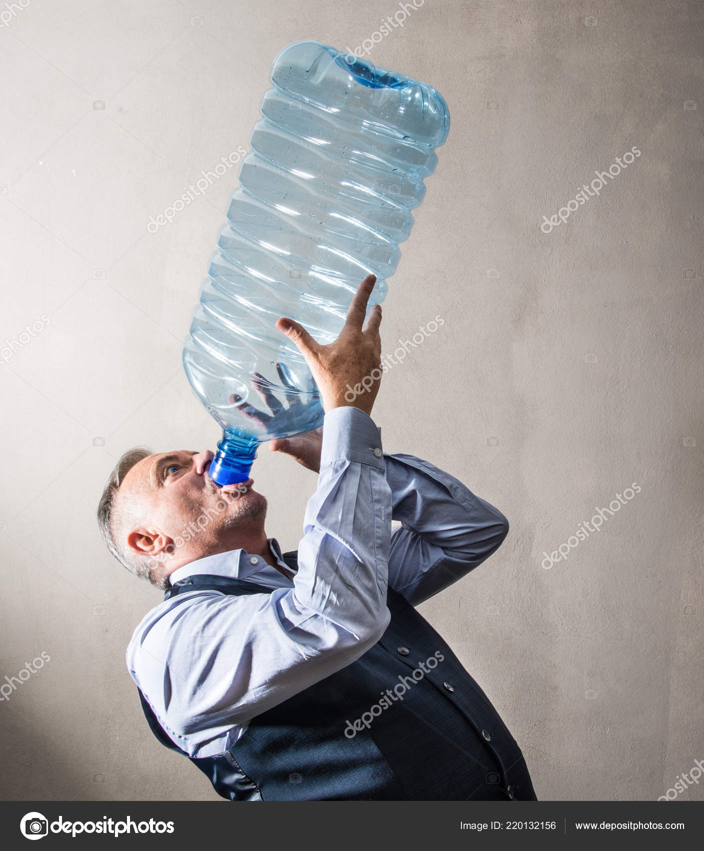 Man Giant Water Bottle — Stock Photo © Photobeps #220132156