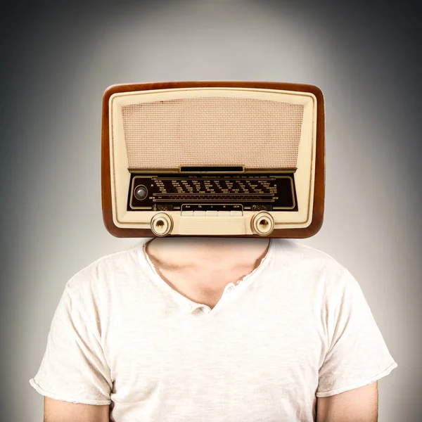 a Person with a radio instead of the head