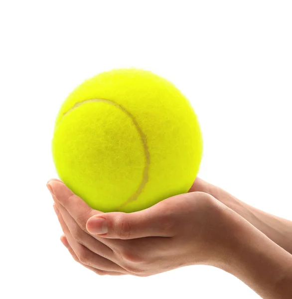 Mãos segurando uma bola de tênis — Fotografia de Stock