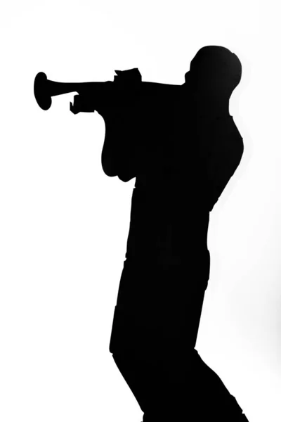 白い背景にミュージシャンの影 — ストック写真