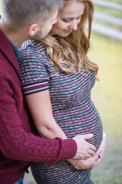 A portrait of young married couple expecting a baby — Stock Photo, Image