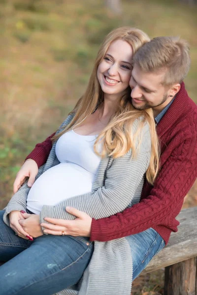 A portrait of young married couple expecting a baby — Stock Photo, Image