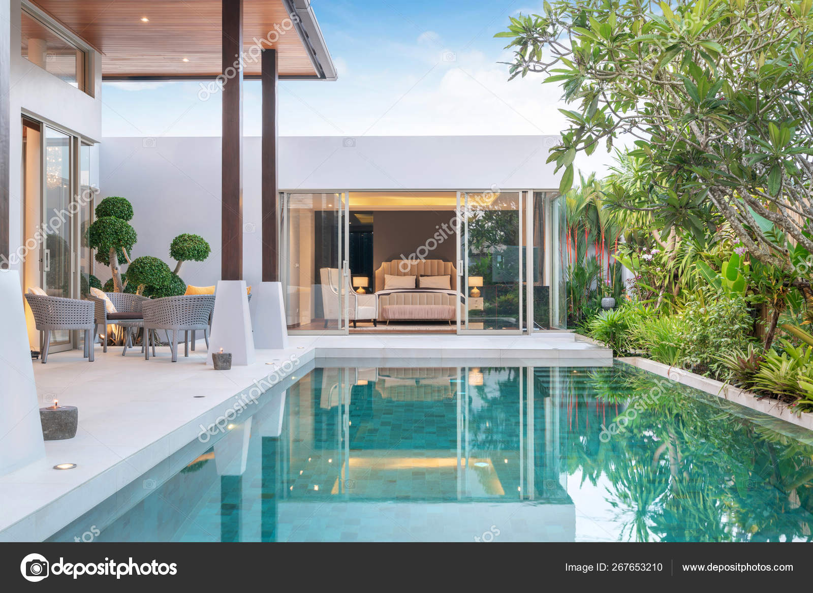 Home or house building Exterior and interior design showing tropical pool villa with green